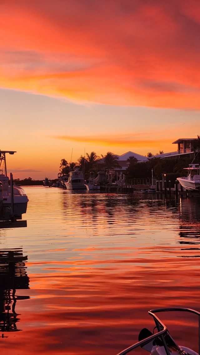IMG_20230109_075908_325 a sunset over a body of water