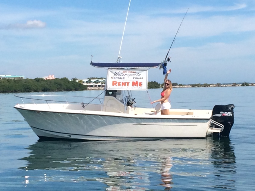 a small boat in a body of water