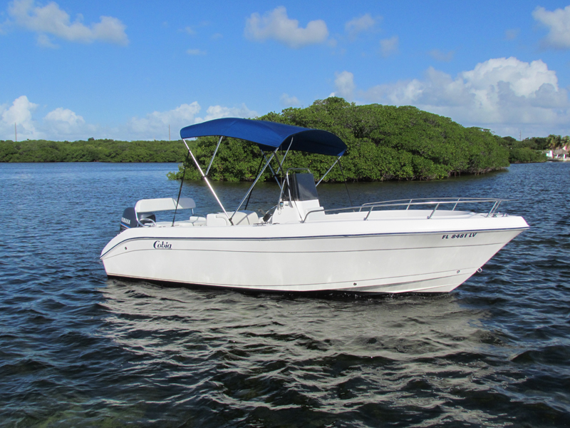 a small boat in a large body of water