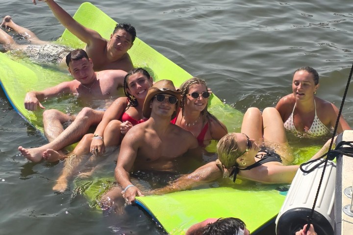 Sara Errani et al. swimming in a body of water